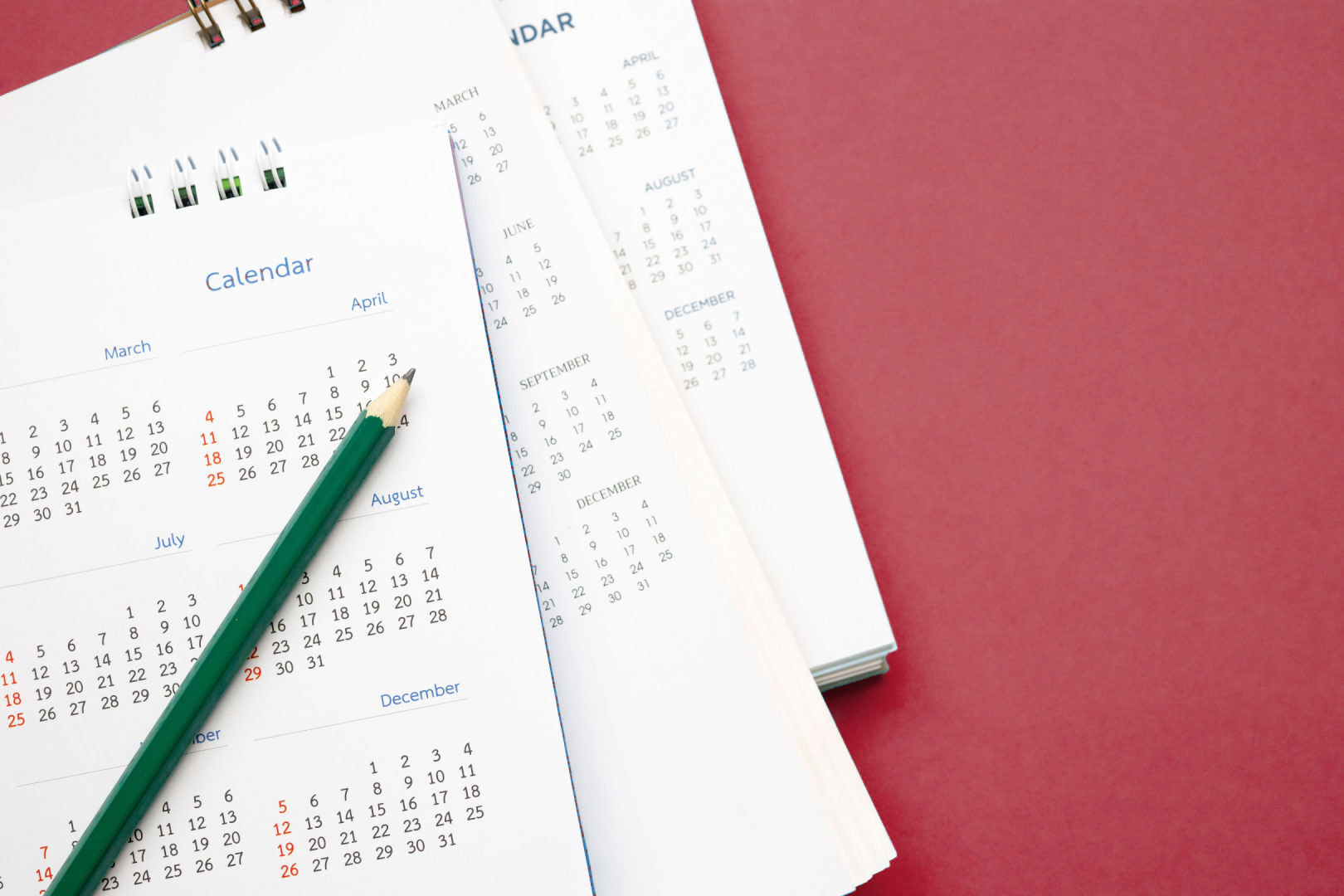 Calendar for EIS deferral relief and pencil (red background)